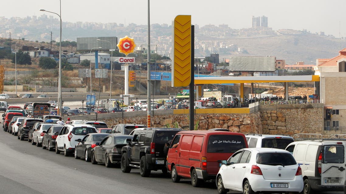 FILE PHOTO: Cars stand in line at a gas station as they wait to fuel up in Damour, Lebanon June 25, 2021. REUTERS/Aziz Taher/File Photo