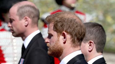 Britain's Prince William and Britain's Prince Harry follow the coffin of Britain's Prince Philip, as it passes through the Parade Ground, during his funeral at Windsor Castle, Britain, April 17, 2021. (Reuters)