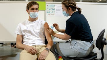 A GGD employee administers the Covid-19 Janssen vaccine in Nieuwegein, on June 25, 2021. (AFP)