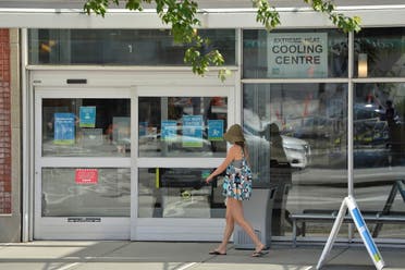 A woman enters a cooling centre during the scorching weather of a heatwave in Vancouver, British Columbia, Canada June 27, 2021.  (Reuters)