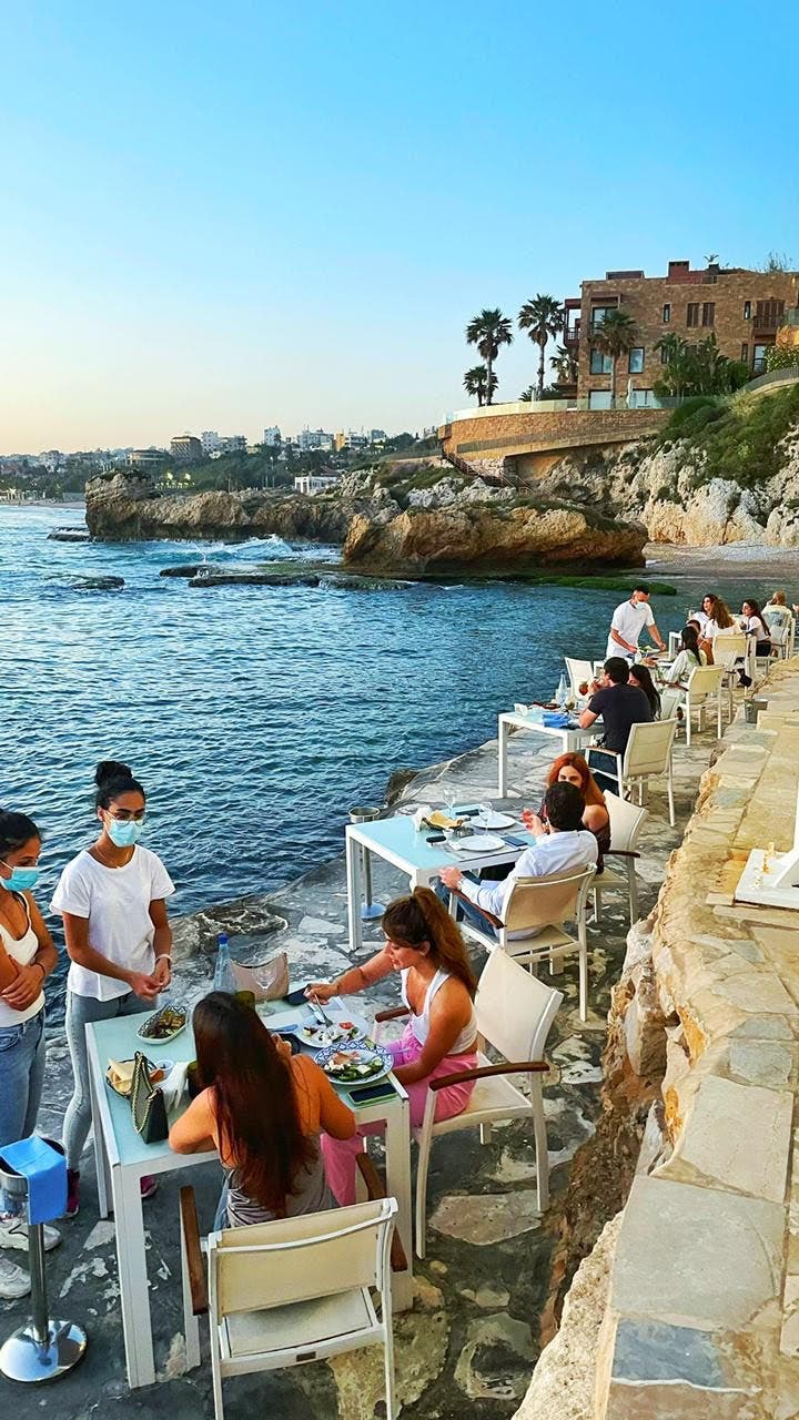 Lunch by the sea in Byblos, Lebanon on June 12, 2021.