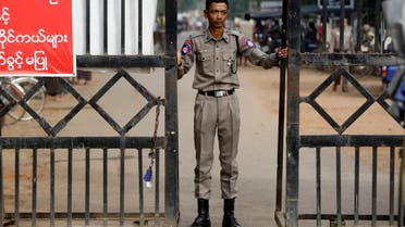 A prison staff stands guard at Insein prison in Yangon, Myanmar, January 3, 2019. (Reuters)