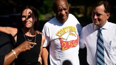 Bill Cosby is welcomed outside his home after Pennsylvania's highest court overturned his sexual assault conviction and ordered him released from prison immediately, in Elkins Park. (Reuters)