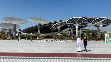 People walk at the site of Dubai Expo 2020 in Dubai. (Reuters)