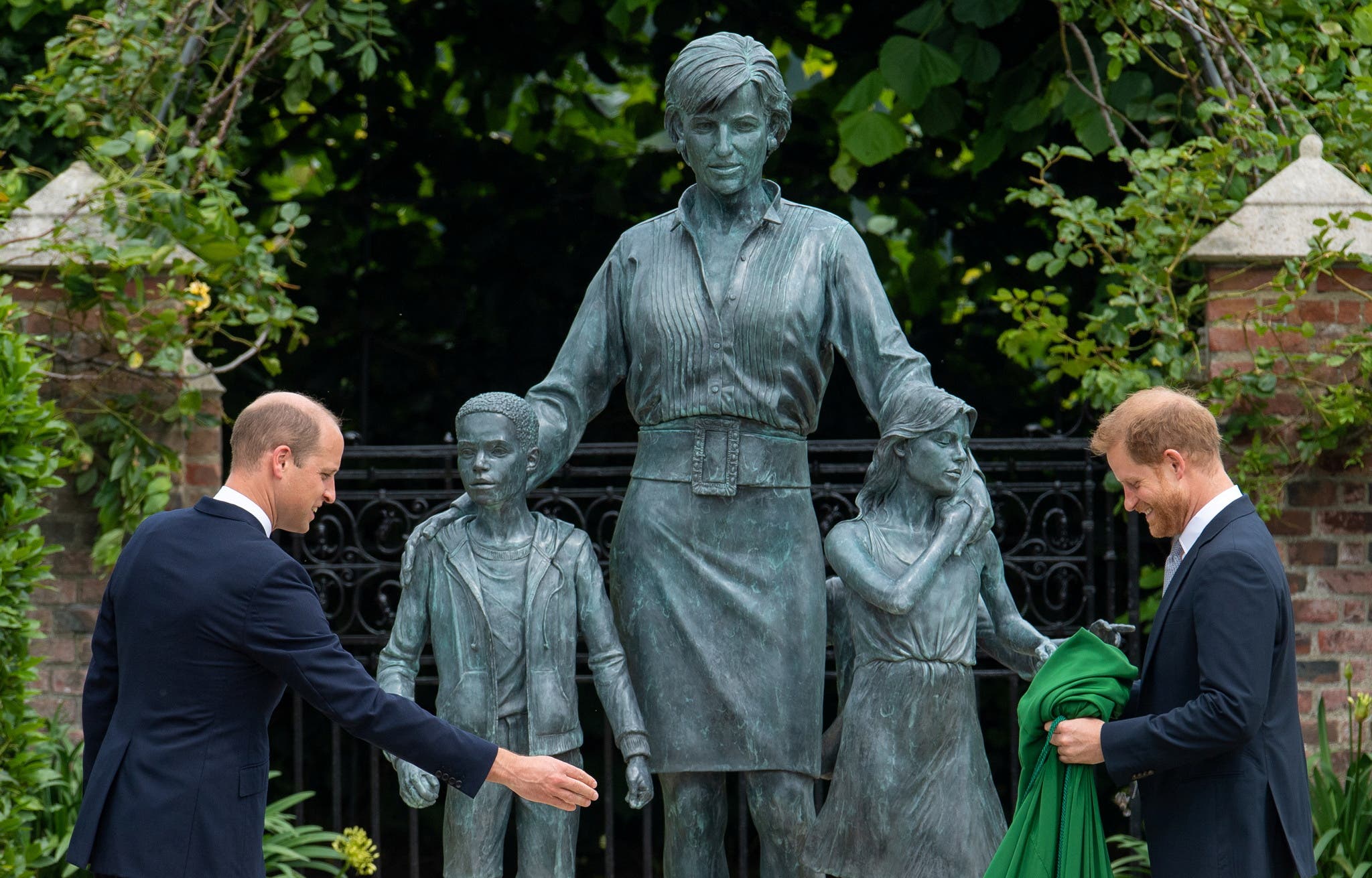 Princes William and Harry at the unveiling of the statue of Princess Diana