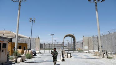 An Afghan National Army soldier stands guard at the gate of Bagram U.S. air base, on the day the last of American troops vacated it, Parwan province, Afghanistan July 2, 2021. (Reuters)