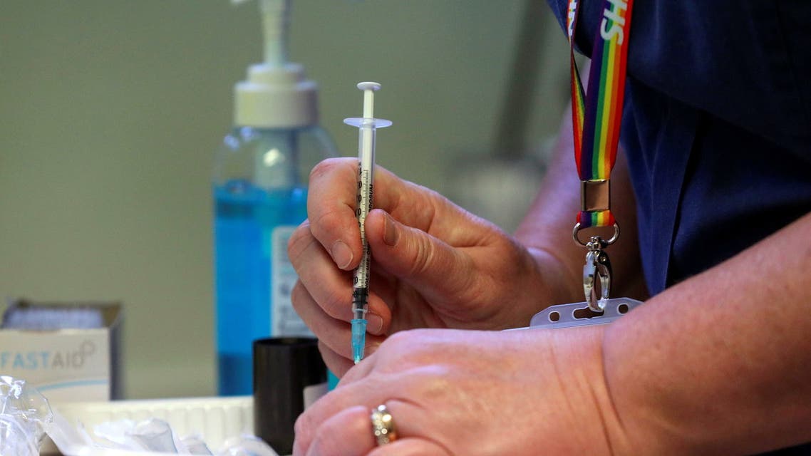 View of the Pfizer/BioNtech COVID-19 vaccine injections at GP-led clinic in Chalfont St Peter, Buckinghamshire, as hundreds of vaccination centres run by local doctors begin opening across England December 14, 2020. (Reuters)