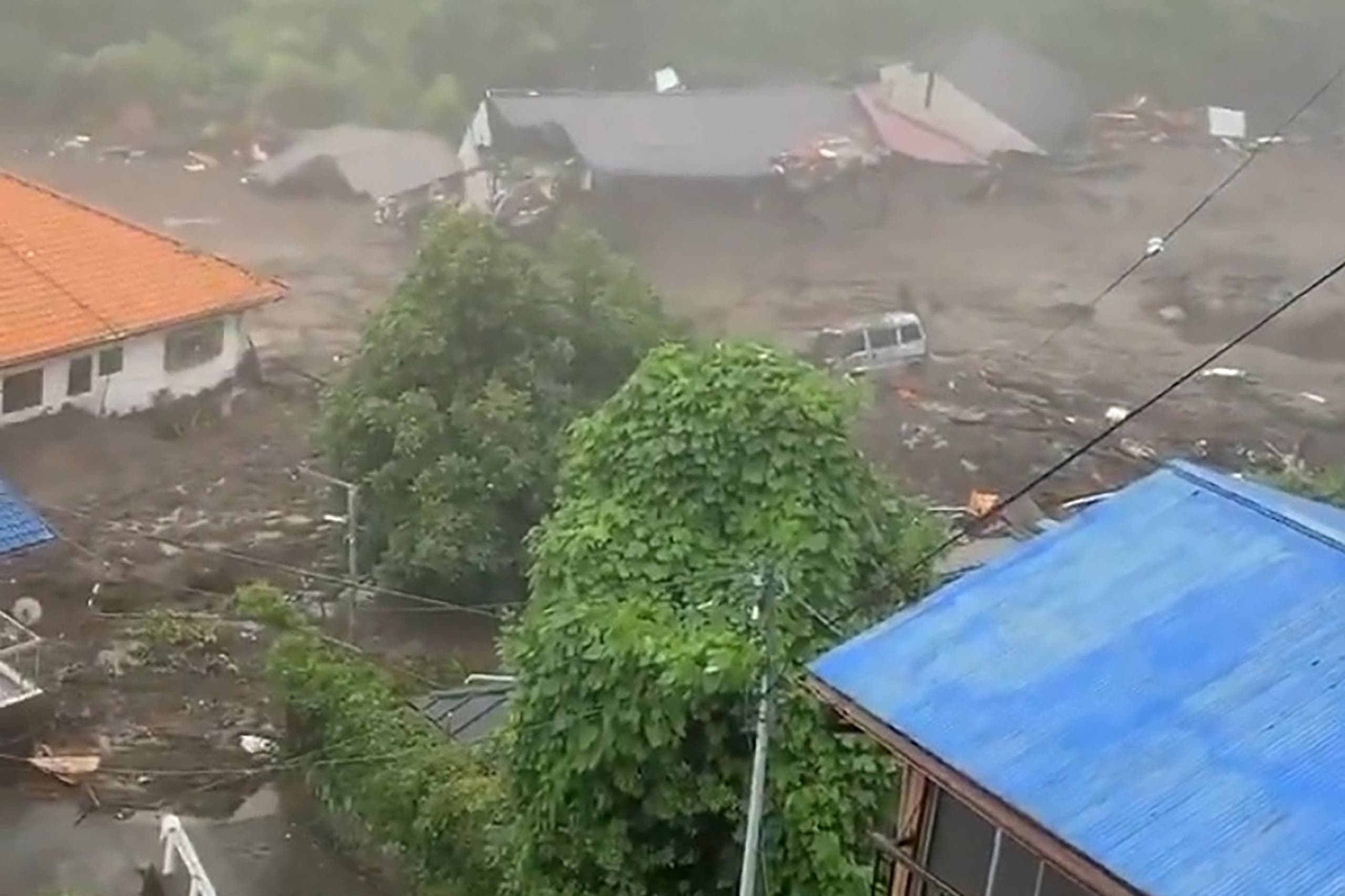 This grab taken from handout video released by a local resident and received via Jiji Press on July 3, 2021 shows mud and debris at the scene of a landslide that has left at least 19 people missing in the Izusan area of Atami in Shizuoka Prefecture. (AFP)