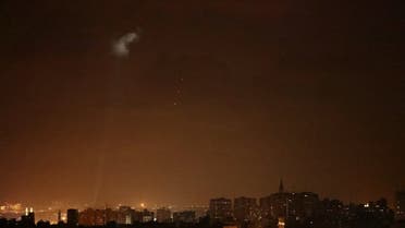Shootings from the Palestinian territory light-up the night sky in Gaza city, on July 3, 2021, in response to the bombing of Israeli planes on Gaza military targets. (AFP)