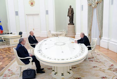 Russian President Vladimir Putin (R) meets Armenian PM Nikol Pashinyan (L) and Azerbaijani President Ilham Aliyev over Nagorno-Karabakh, in Moscow, Jan. 11, 2021. (Reuters)