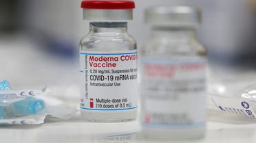 A vial of the Moderna COVID-19 vaccine is seen at a local clinic as the spread of the coronavirus disease continues in Germany, January 15, 2021. (Reuters)