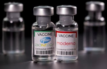 Vials with Pfizer-BioNTech and Moderna coronavirus disease (COVID-19) vaccine labels are seen in this illustration picture taken March 19, 2021. (Reuters)