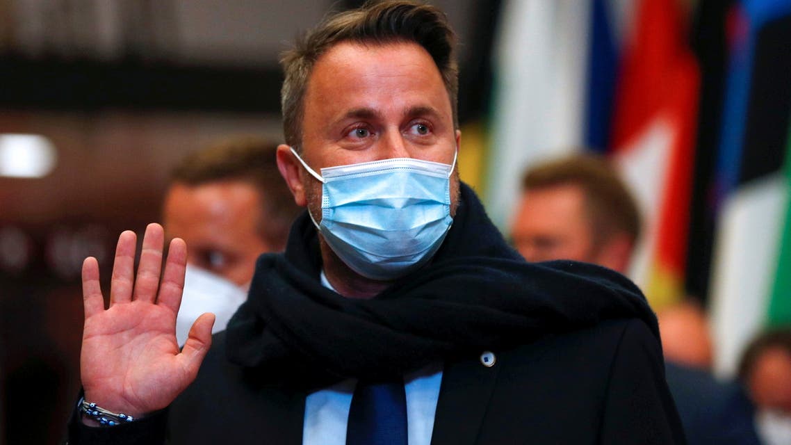 Luxembourg's Prime Minister Xavier Bettel waves at the end of the first day of a European Union leaders meeting in Brussels, Belgium, June 25, 2021. (Reuters)