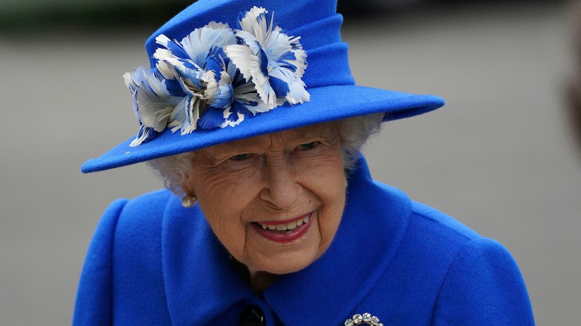Britain's Queen Elizabeth II reacts during a visit to a community project in Glasgow, Scotland, as part of her traditional trip to Scotland for Holyrood Week, Wednesday June 30, 2021. (File photo: AP)