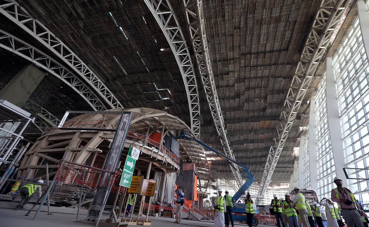 Visitors and journalists tour the construction site of the midfield terminal of Abu Dhabi International Airport in Abu Dhabi, UAE. (Reuters)