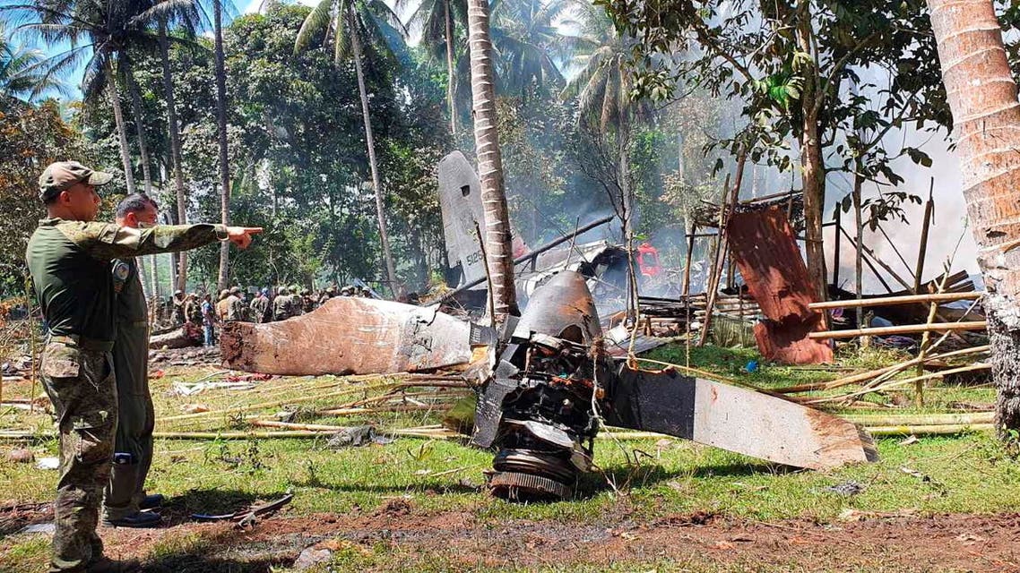 View of the site after a Philippines Air Force Lockheed C-130 plane carrying troops crashed on landing in Patikul, Sulu province, Philippines July 4, 2021. (Reuters)