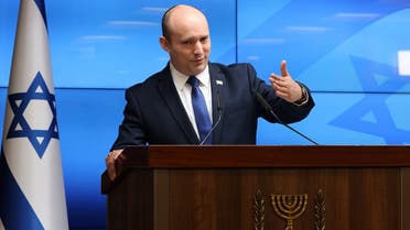 Israeli Prime Minister Naftali Bennett speaks during a news conference on economy in Jerusalem, July 6, 2021. (Menahem Kahana/Pool via Reuters)
