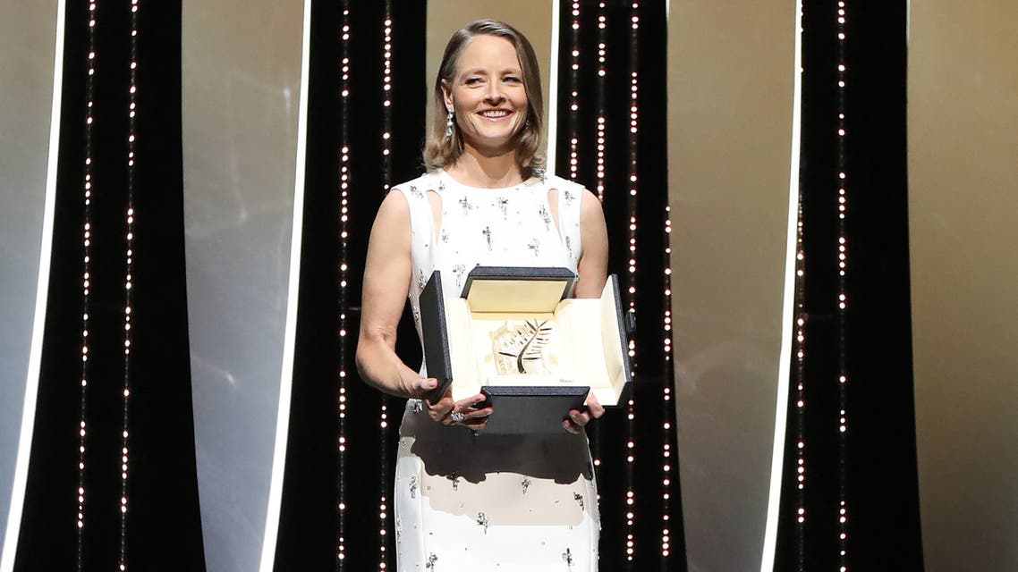 US actress and director Jodie Foster poses on stage after she received a Palme d'Or Life Achievement Award during the opening ceremony of the 74th edition of the Cannes Film Festival in Cannes, southern France, on July 6, 2021.