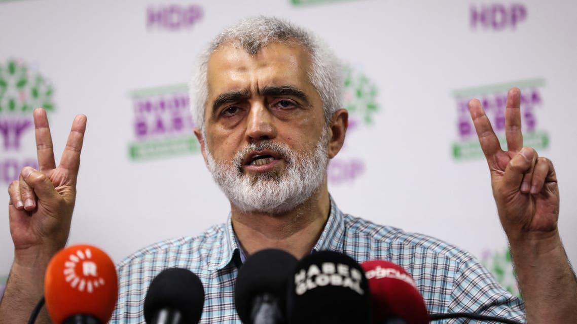 Peoples' Democratic Party (HDP) former member of parliament Omer Faruk Gergerlioglu (R) gestures as he speaks during a press conference after being released from the Sincan Prison, in Ankara, on July 6, 2021. A Turkish court on July 6, 2021 ordered the release of a pro-Kurdish opposition politician who had been in prison since April on terror-related charges, local media and his family said. Omer Faruk Gergerlioglu, an outspoken rights defender from the Peoples' Democratic Party (HDP), was handed a two-and-a-half-year prison sentence in April for spreading terrorist propaganda online over a post he shared in 2016 before he was elected an MP.
