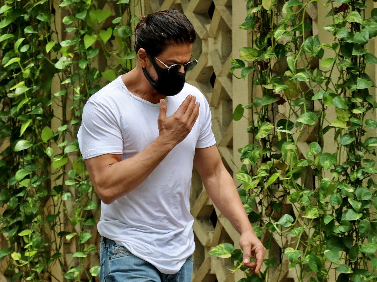 Actor Shah Rukh Khan arrives to pay his respect at the residence of Bollywood actor Dilip Kumar after he died in a hospital in Mumbai, India, on July 7, 2021. (Reuters)