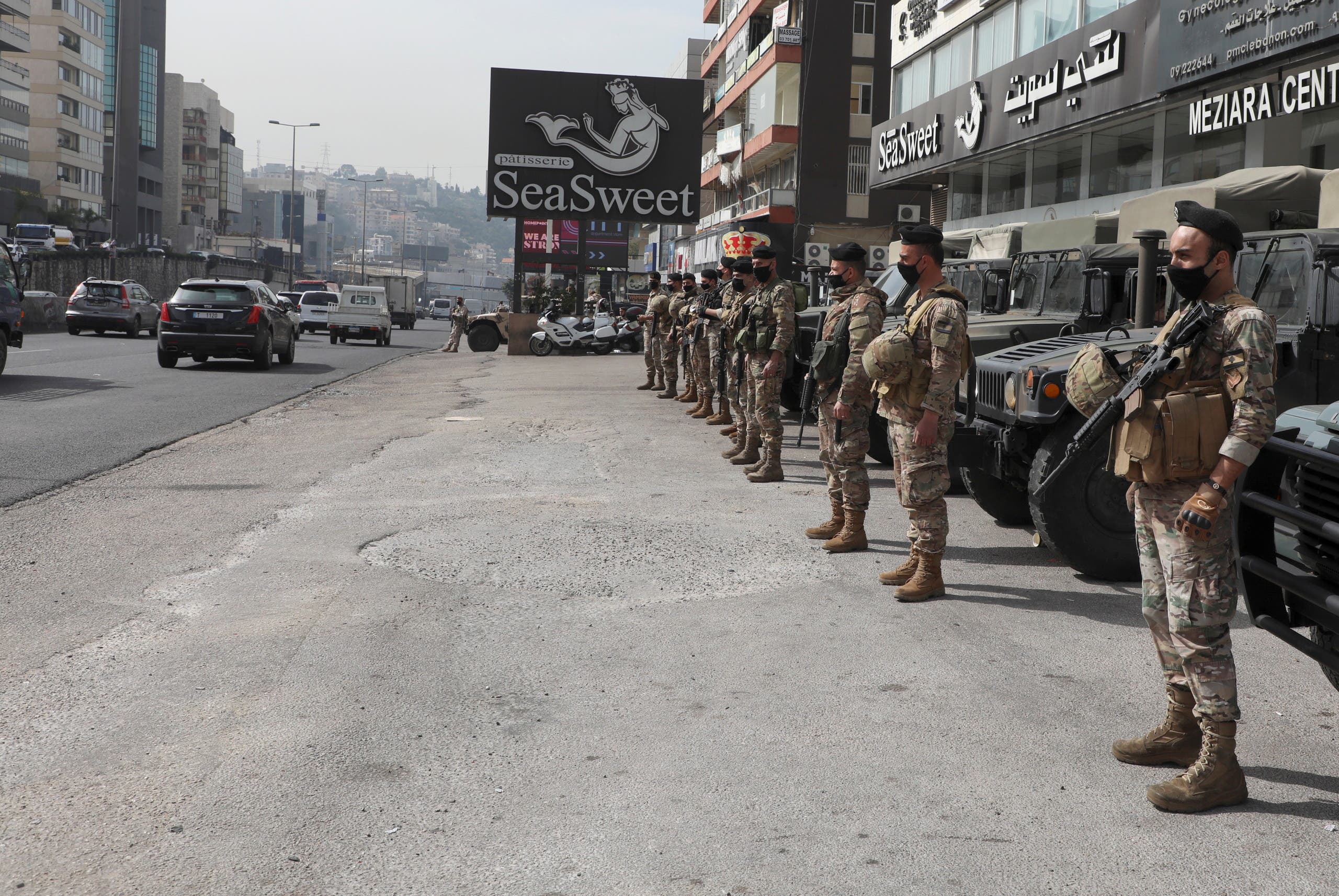 Lebanese army soldiers stand together as they are deployed in Zouk, Lebanon March 10, 2021. (Reuters)