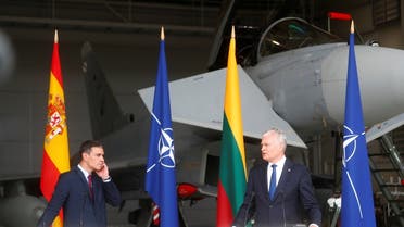 Spanish Prime Minister Pedro Sanchez and Lithuanian President Gitanas Nauseda attend a news conference in Siauliai air base, Lithuania, on July 8, 2021. (Reuters)