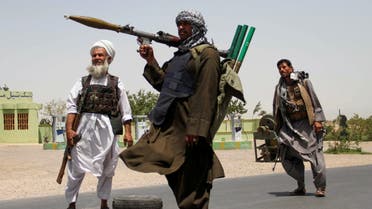 Former Mujahideen hold weapons to support Afghan forces in their fight against Taliban, on the outskirts of Herat province, Afghanistan July 10, 2021. (Reuters)