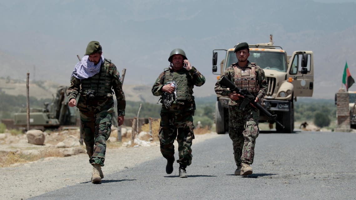 Afghan National Army (ANA) soldiers patrol the area near a checkpoint recaptured from the Taliban, in the Alishing district of Laghman province, Afghanistan July 8, 2021. (Reuters)