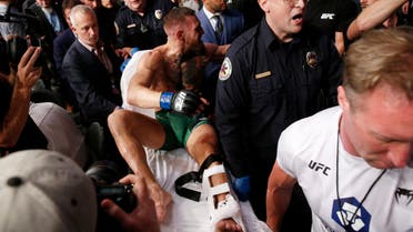 Conor McGregor is stretchered from the octagon after the fight. (Reuters)