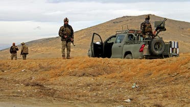 Afghan security forces keep watch outside of a military compound after a car bomb blast on the outskirts of Ghazni city, Afghanistan. (File photo: Reuters)