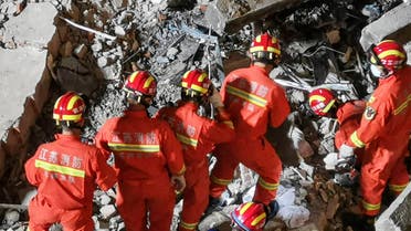 This photo taken on July 12, 2021 shows rescuers searching at the site of a hotel after it collapsed leaving at least one dead and 10 others missing in the city of Suzhou in China's eastern Jiangsu province. (File photo: AFP)