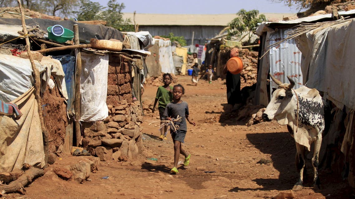 Eritrean refugee children walk within the Mai-Aini refugee camp near the Eritrean border in Tigrai region in Ethiopia, February 10, 2016. Eritrea expects to have four operating mines in 2018 producing gold, copper, zinc and potash, part of a bid by the poor nation to build an industry on what is almost virgin mining territory, a top mining official told Reuters. To match text ERITREA-MINING/ Picture taken February 10, 2016. (Reuters)