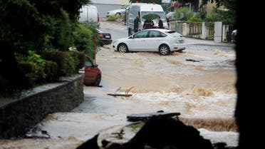 A flooded street is seen following heavy rainfalls in Hagen, Germany, on July 14, 2021. (Reuters)