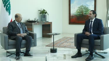 Lebanon's President Michel Aoun meets with Lebanese Prime Minister-Designate Saad al-Hariri at the presidential palace in Baabda, Lebanon July 14, 2021. (Reuters)