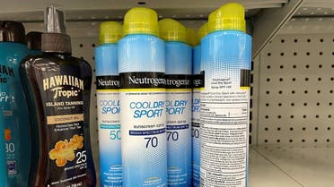 Johnson & Johnson’s Neutrogena Cool Dry Sport sunscreen, which is part of a voluntary recall of five Neutrogena and Aveeno brand aerosol sunscreen products after a cancer-causing chemical was detected in some samples, sits on a shelf at a store in Gloucester, Massachusetts, US, on July 15, 2021. (Reuters)