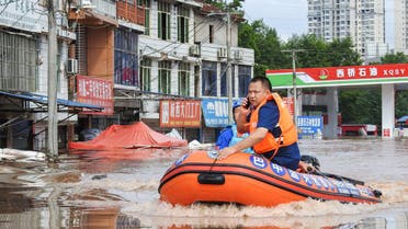 This photo taken on July 11, 2021 shows rescuers searching for residents affected by flood following heavy rains in Dazhou, in China's southwestern Sichuan province. (File photo: AFP)