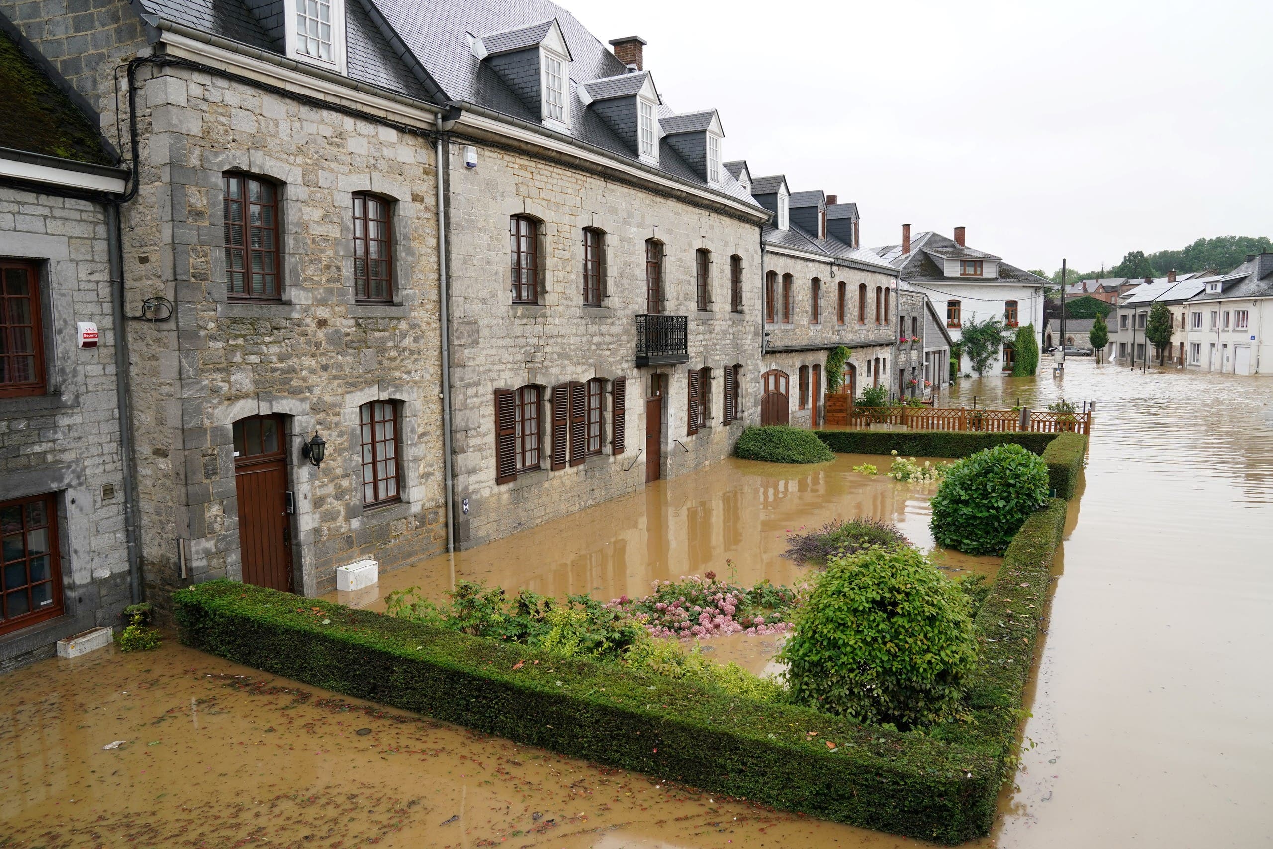 This picture shows a flooded street in Rochefort on July 15 2021 as disaster plan has been declared in Belgium's provinces of Liege, Luxembourg and Namur after heavy rains and floods lashing western Europe have killed at least two people in the country. (File photo: Reuters)