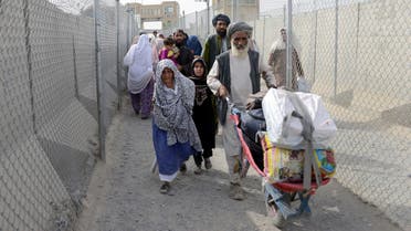 Afghan refugee families return to Afghanistan through the Pakistan border crossing at Spin Boldak, in southern Kandahar province on August 6, 2016. (AFP)