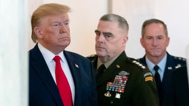 President Donald Trump after a ballistic missile strike that Iran launched against Iraqi air bases housing US troops, Jan. 8, 2020, accompanied by Joint Chiefs Chairman Gen. Mark Milley. (AP)