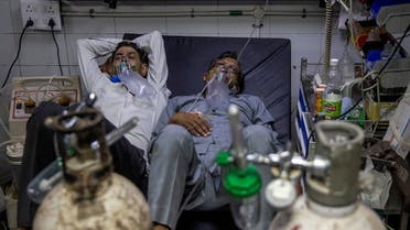Patients suffering from the coronavirus disease (COVID-19) get treatment at the casualty ward in Lok Nayak Jai Prakash (LNJP) hospital, amidst the spread of the disease in New Delhi, India April 15, 2021. (Reuters)