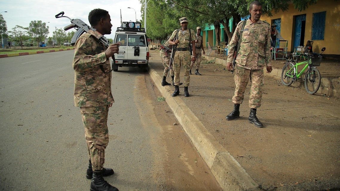 Members of Amhara Special Forces stand guard along a street in Humera town, Ethiopia, on July 1, 2021. (Reuters)