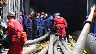 Chinese workers trapped in flooded highway tunnel for second day
