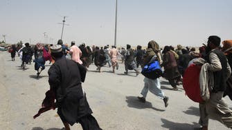 Pakistan allows thousands to cross into border town seized by Taliban