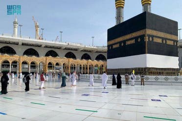 A guide leads Muslims as they begin the Hajj ritual on July 17, 2021 amid the coronavirus pandemic in Mecca, Saudi Arabia. (SPA)