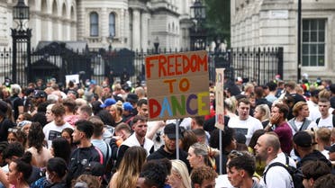 Demonstrators calling for nightclubs to reopen gather outside Downing Street during the Save Our Scene protest, amid the coronavirus disease (COVID-19) pandemic, in London, Britain June 27, 2021. (Reuters)