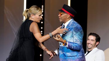 Director Julia Ducournau, Palme d'Or award winner for the film Titane, is congratulated by Spike Lee, Jury President of the 74th Cannes Film Festival. (Reuters)