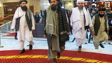 Mullah Abdul Ghani Baradar, the Taliban's deputy leader and negotiator, and other delegation members attend the Afghan peace conference in Moscow, Russia March 18, 2021. Alexander Zemlianichenko/Pool via REUTERS