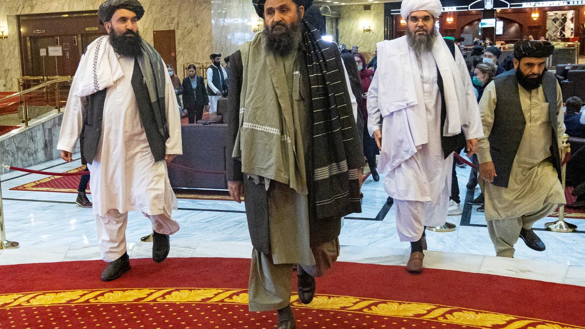 Mullah Abdul Ghani Baradar, the Taliban's deputy leader and negotiator, and other delegation members attend the Afghan peace conference in Moscow, Russia March 18, 2021. Alexander Zemlianichenko/Pool via REUTERS