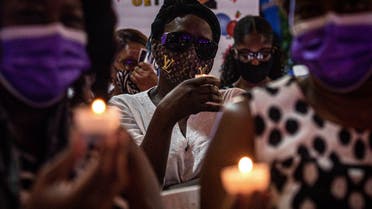 People attend a vigil in honor of Haiti's slain president Jovenel Moise, in Little Haiti neighborhood, Miami, Florida, on July 16, 2021. (AFP)