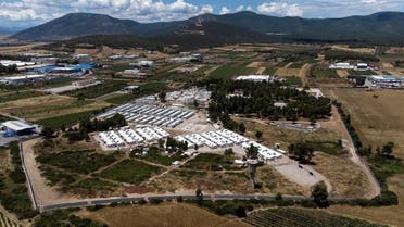 An aerial view of the Ritsona camp for refugees and migrants surrounded by a newly built concrete wall, in Greece, on June 15, 2021. (Reuters)